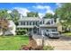 Charming two-story home featuring a welcoming front porch, well-manicured lawn, and an attached two-car garage at 4309 Birmingham Way, Raleigh, NC 27604