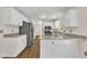 Spacious kitchen with modern appliances, featuring granite countertops and stainless steel refrigerator at 4309 Birmingham Way, Raleigh, NC 27604
