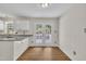 Bright kitchen with stainless steel appliances, granite countertops and french doors at 4309 Birmingham Way, Raleigh, NC 27604
