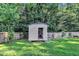 There is a backyard shed offering additional storage space and functionality to the outdoor area at 4309 Birmingham Way, Raleigh, NC 27604