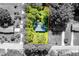 Aerial view of a wooded property with house and defined property lines at 452 N Main St, Wendell, NC 27591