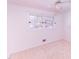 Bright bedroom with ceiling fan and windows offering natural light at 452 N Main St, Wendell, NC 27591