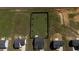 An aerial shot of a home with a fenced backyard, offering a sense of privacy and space at 46 Bellini Dr, Angier, NC 27501