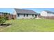 Spacious backyard featuring a privacy fence at 46 Bellini Dr, Angier, NC 27501
