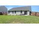 Spacious backyard featuring a privacy fence at 46 Bellini Dr, Angier, NC 27501