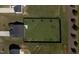 An aerial view showcases a generously sized, fenced backyard with young trees at 46 Bellini Dr, Angier, NC 27501