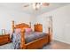 Bedroom featuring a ceiling fan, carpeted floor, and wooden furniture at 46 Bellini Dr, Angier, NC 27501