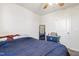 Bedroom features white walls and includes a mirror at 46 Bellini Dr, Angier, NC 27501