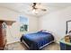 Bedroom with ceiling fan and window at 46 Bellini Dr, Angier, NC 27501