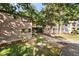 Exterior facade with mature shade trees at 5082 Flint Ridge Pl, Raleigh, NC 27609