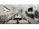 Stylish living room with modern decor, balcony access, and ample natural light at 5082 Flint Ridge Pl, Raleigh, NC 27609