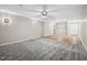 Open-concept living room with carpet, and wood floors at 5082 Flint Ridge Pl, Raleigh, NC 27609