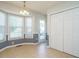 Bright dining area featuring a bay window, tile flooring, and a view to the outdoor deck at 516 Yellow Berry, Wendell, NC 27591