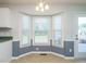 Cozy dining area with natural light, three bay windows, and easy access to the deck at 516 Yellow Berry, Wendell, NC 27591
