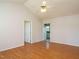 Spacious living room with high ceilings, hardwood floors, and two entryways to other rooms at 516 Yellow Berry, Wendell, NC 27591