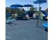 Community playground with slides, swings, and climbing structures for Gathering fun at 516 Yellow Berry, Wendell, NC 27591