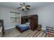A cozy bedroom with vinyl flooring, bunk beds, ceiling fan, and lots of natural light at 5307 Green Riley Rd, Rougemont, NC 27572