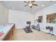 Bonus room features an exercise space and shuffleboard table at 5328 Willow Cry Ln, Raleigh, NC 27613