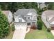 Aerial view of home featuring a grey roof and landscaping at 5629 Clearsprings Dr, Wake Forest, NC 27587