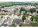 Expansive aerial view showcases the neighborhood's layout and lush green surroundings at 5629 Clearsprings Dr, Wake Forest, NC 27587