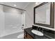Bathroom featuring a vanity and shower and tub combination at 6332 Mountain Oaks Way, Wake Forest, NC 27587