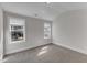 Cozy carpeted bedroom with two windows providing natural light at 6332 Mountain Oaks Way, Wake Forest, NC 27587