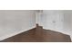 A bedroom with hardwood floors and double door closet at 6332 Mountain Oaks Way, Wake Forest, NC 27587