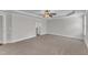 Spacious bedroom featuring soft carpet and large windows at 6332 Mountain Oaks Way, Wake Forest, NC 27587