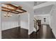 Elegant dining room with coffered ceiling, chandelier, and wainscoting at 6332 Mountain Oaks Way, Wake Forest, NC 27587