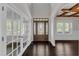 Home entryway with dark wood flooring and arched wall opening at 6332 Mountain Oaks Way, Wake Forest, NC 27587