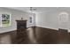Bright and airy living room with fireplace, windows, and hardwood floors at 6332 Mountain Oaks Way, Wake Forest, NC 27587