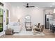 Bright and inviting living room with comfortable seating, modern decor, and plenty of natural light at 703 E Markham Ave, Durham, NC 27701