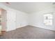Well-lit bedroom featuring plush carpeting, two closets and a bright, airy atmosphere at 709 Woodgreen Dr, Durham, NC 27704