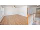 Upstairs hallway with wood floors and a wooden railing overlooking the staircase at 709 Woodgreen Dr, Durham, NC 27704