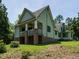 Beautiful view of the backyard, complemented by mature trees at 714 Spring Ln, Sanford, NC 27330