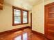 Bright room featuring hardwood floors, natural light, and neutral wall colors at 714 Spring Ln, Sanford, NC 27330
