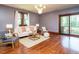 Comfortable living room with hard wood floors, plenty of seating and natural light at 714 Spring Ln, Sanford, NC 27330