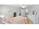 Light bedroom featuring bright walls, a comfy bed, and built-in shelving and storage at 812 Bear Tree Crk, Chapel Hill, NC 27517