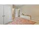 Bedroom showcasing bright walls and closet, a patterned duvet cover and natural light from bright windows at 812 Bear Tree Crk, Chapel Hill, NC 27517