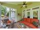 Inviting screened porch with comfortable seating is ideal for enjoying the outdoors in a relaxed setting at 812 Bear Tree Crk, Chapel Hill, NC 27517