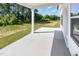 Covered back porch area perfect for relaxing, overlooks the backyard at 823 Biltmore Dr, Sanford, NC 27332