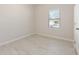 Cozy bedroom featuring light wood flooring, natural light and neutral decor at 823 Biltmore Dr, Sanford, NC 27332