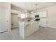 Modern kitchen featuring an island, stainless appliances, ample cabinet space, and light countertops at 823 Biltmore Dr, Sanford, NC 27332