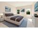 Serene main bedroom with modern decor, featuring ample natural light and neutral tones at 823 Biltmore Dr, Sanford, NC 27332