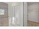 Bathroom with a glass shower door and neutral tones throughout at 87 Royal Meadow Dr, Angier, NC 27501