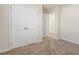 Bedroom features a double-door closet and neutral carpeting at 87 Royal Meadow Dr, Angier, NC 27501