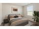 Bedroom with natural light, calming decor, and a comfortable bed at 87 Royal Meadow Dr, Angier, NC 27501