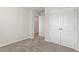 Bedroom featuring a double-door closet and neutral carpet at 87 Royal Meadow Dr, Angier, NC 27501