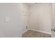 Walk-in closet with wire shelving and neutral-toned flooring at 87 Royal Meadow Dr, Angier, NC 27501