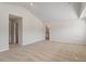 Carpeted bedroom featuring high ceilings and ensuite bathroom at 94 Taverners Ln, Angier, NC 27501